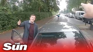 Motorist drives into vigilante cyclist as he stops driver on wrong side of road [upl. by Chancellor]