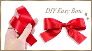 How to tie the perfect bow  DIY ribbon bow  How to make simple satin bow  Gift Wrapping Land [upl. by Halsy]