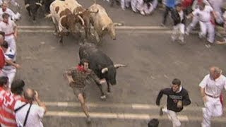 Spains San Fermin bull running festival draws thousands [upl. by Natanhoj]