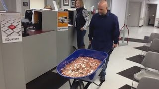 Man Pays Nearly 3000 Bill Using A Wheelbarrow Full Of Pennies [upl. by Africah]