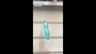 Why doesnt water come out of a bottle in free fall geopop experiment science [upl. by Earal]