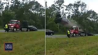 Distracted Florida Driver Launches Car Off Tow Truck Ramp at High Speed on Highway [upl. by Ciaphus]