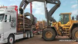 Unloading timber truck with highlift [upl. by Sidhu]