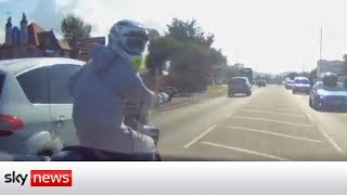 Road rage driver knocks motorcyclist off bike after 50mph chase [upl. by Karie]