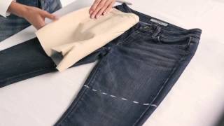 How to Cut Jeans Into Shorts  Fashion Tutorial  InStyle [upl. by Gilbertina]