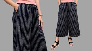 Cutting and sewing wide leg pants with pockets  Easy instructions for sewing beautiful pants [upl. by Yekram]