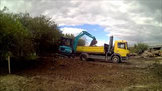 Sunward SWE35UF load dirt on Mercedes Atego [upl. by Eeryt]