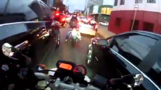 this crazy dude shows how to ride a motorbike during rush hour  WIN [upl. by Eelydnarb]