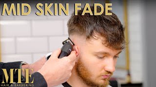 Mid Skin Fade Tutorial  Barbering [upl. by Maddis625]