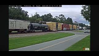 CSX heritage unit leading CSX manifest train at Folkston Railcam [upl. by Airdnaxela809]