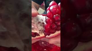 ASMR pomegranate peeling🫨😮‍💨 shorts [upl. by Elrebmik]