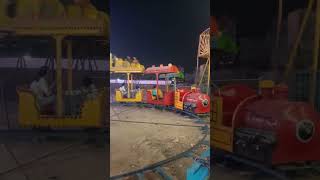 Noida fair in maharishi mahotshav Train wala jhoola [upl. by Ajnotal]