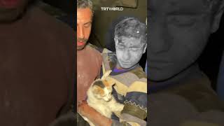 Palestinian boy rescued from the rubble refuses to part with his cat [upl. by Varini]