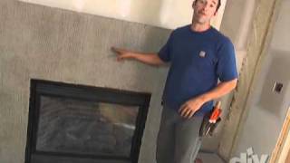 Stacked Stone Fireplace HowToDIY [upl. by Akenehs]