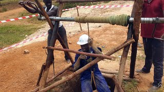 How to dig a shallow water well using manual labor  Digging a hand dug water well [upl. by Yelrebma]