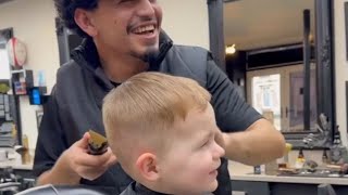 Adorable kid cant stop laughing while getting his hair trimmed  WooGlobe [upl. by Meier716]