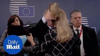 Bizarre moment JeanClaude Juncker RUFFLES WOMANS HAIR [upl. by Anivel]