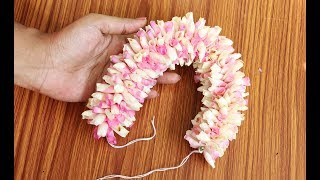 easy method to string rose petals garland  how to make a flower garland with rose petals [upl. by Elliot]