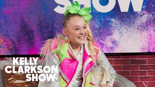 JoJo Siwa Fills An Entire Suitcase With Bows For Her Tour [upl. by Semadar]