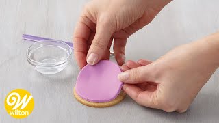 How to Apply Fondant Decorations on Cakes and Other Desserts  Wilton [upl. by Boleslaw]