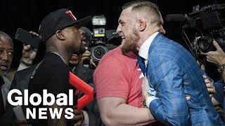 Floyd Mayweather vs Conor McGregor Toronto press conference showdown [upl. by Ynnol]