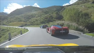 McLaren P1 chases a Ferrari LaFerrari on Furkapass Switzerland [upl. by Asusej]