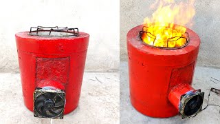 How to make a highly efficient wood stove with a fan  how to make cement wood stove [upl. by Anwahsak783]