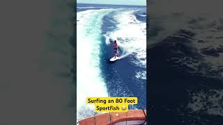 Surfing behind an 80 foot sportfishing yacht  sportfish boat [upl. by Ferreby]