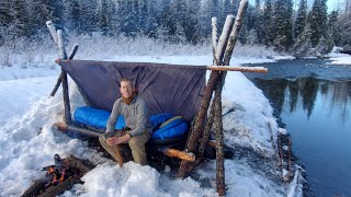 HOT ROCKS in my Bushcraft Cot  Winter Camping in Alaska with a Survival Shelter [upl. by Alegnaoj]