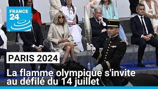 Paris 2024  la flamme olympique sinvite aux festivités du 14 juillet dans la capitale [upl. by Mulford822]