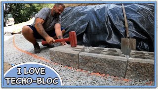 Starting a Curved Concrete Block Retaining Wall [upl. by Ronal731]