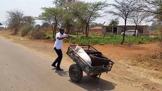 Mandlenkosi Mavengere Migration Catalyst pushing a scania trolley in Zimbabwe [upl. by Rettuc]