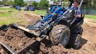 Digga 4in1 Bucket on a MultiOne loader  Digga Australia [upl. by Nereids205]