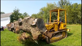 Unearthing a GIANT LOG with a 55 year old Traxcavator 4k [upl. by Kareem446]