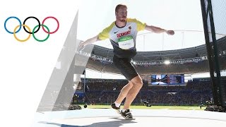 Germanys Harting wins Discus gold [upl. by Ayerhs371]