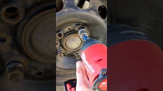 Removing wheel bolts with Milwaukee M18 impact driver [upl. by Rorie]