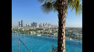 United Arab Emirates Dubai Aloft Al Mina  rooftop pool with amazing view and Burj Khalifa [upl. by Nagek]