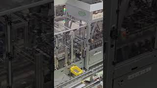 Robot packaging chocolate Shiroi Koibito White choco factory Hokkaido Japan [upl. by Tegan]