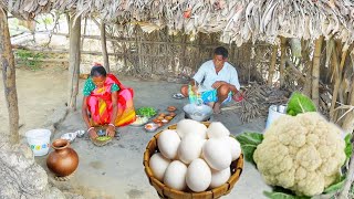 EGG CAULIFLOWER RECIPE and KOLMI SHAK VAJI cooking by our tribe old couple for lunch [upl. by Merrel]