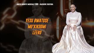 ENJEGERE ZIKUTUKA LYRICS VIDEO  JUDITH BABIRYE MUSICALS 1000 [upl. by Anoo]