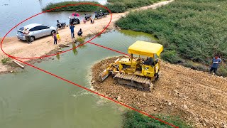 Whole video It is impressive that the KOMATSU Dozer crew can even pour stone to create water road [upl. by Aicyle465]