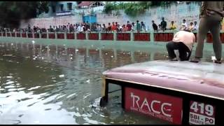 Chennai Rains Dramatic scenes of a bus that was stuck in TNagar Aranganathan subway [upl. by Ettenahc]