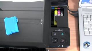 How to Change Ink Cartridges with a Epson Stylus SX125 [upl. by Elda]