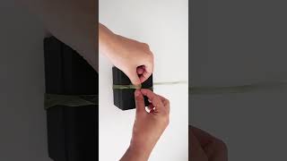 How to Tie a Ribbon Bow on Gift Box shorts [upl. by Ahsit]