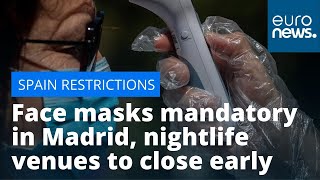 Spain virus restrictions Face masks mandatory in Madrid nightlife venues to close early [upl. by Theurer]