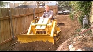 Mini Bull Dozer Struck Magna Trac Junior moving dirt [upl. by Loferski307]