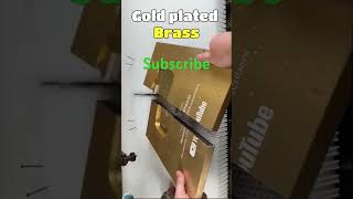 What is inside the YouTube gold buttonGolden play button goldplaybutton yidio iplaytv cr7 [upl. by Hallvard]