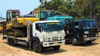 Two Excavators Transport By Self Loader Trucks Komatsu PC200 Kobelco SK200 [upl. by Seline]