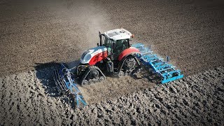 Preparing and Sowing  Steyr 6150 CVT on Soucy tracks  Wifo Koningsplanter [upl. by Ostap]