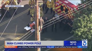 Man scales utility pole in San Fernando Valley [upl. by Latnahc]